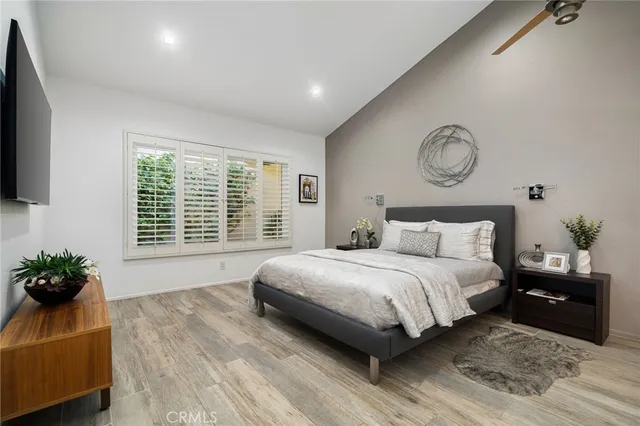 a view of a house with swimming pool and a yard