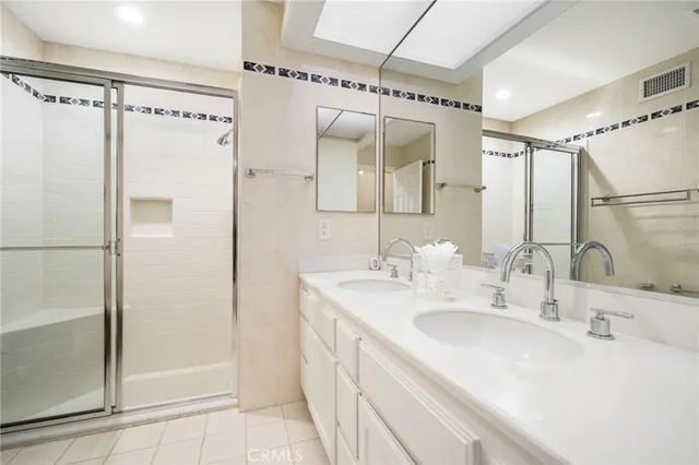 a view of a house with a yard and tree s