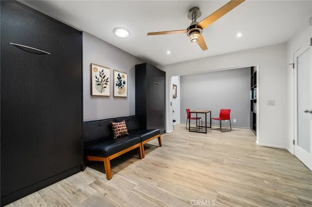 a kitchen with lots of table and chairs