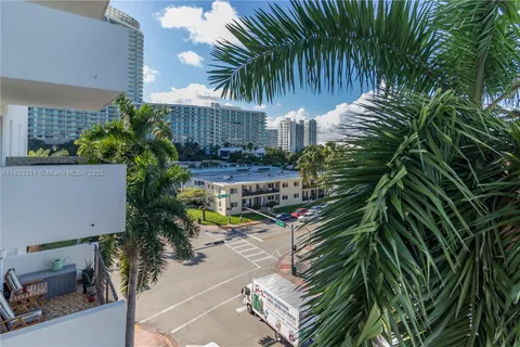 a picture of a building with a garden