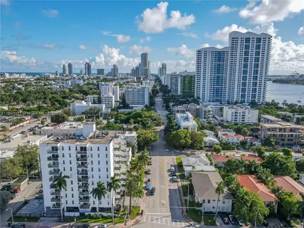 a view of a city with tall buildings