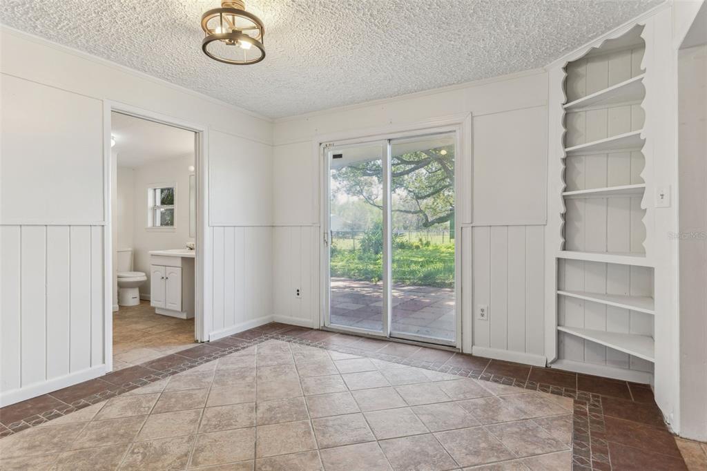 33546 Chancey Road Wesley Chapel, FL 33543 - Photo 18 of 25 a view of an empty room with a window