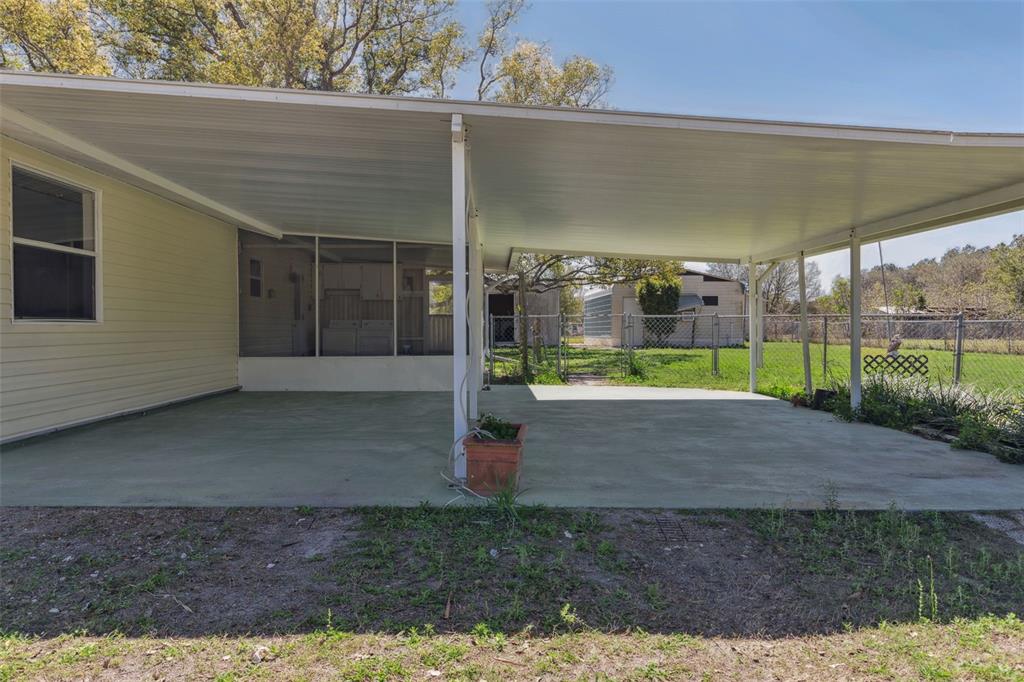 33546 Chancey Road Wesley Chapel, FL 33543 - Photo 4 of 25 a view of a road with porch