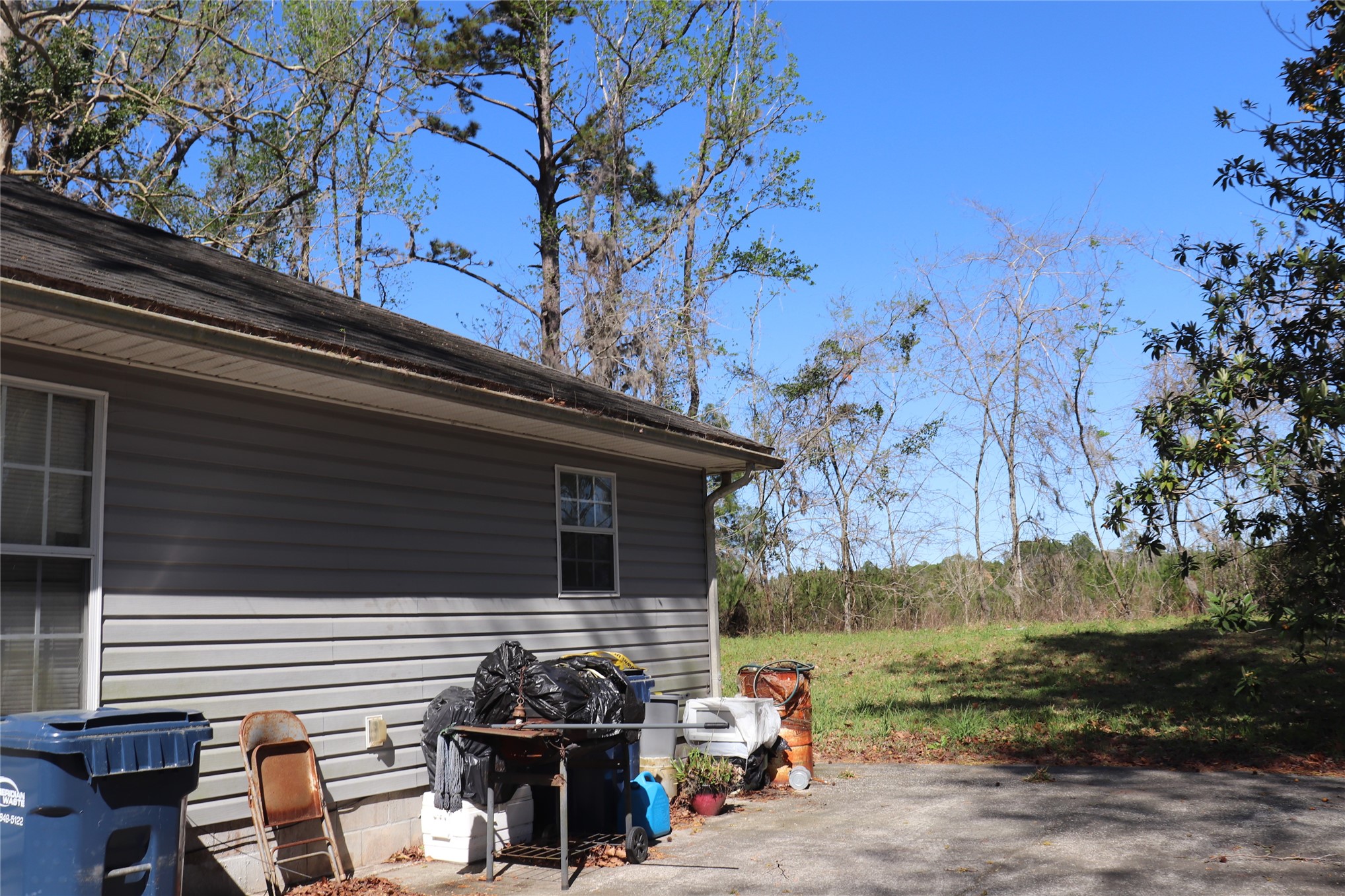 462973 State Road 200 Yulee, FL 32097 - Photo 14 of 18 a view of a house with a backyard
