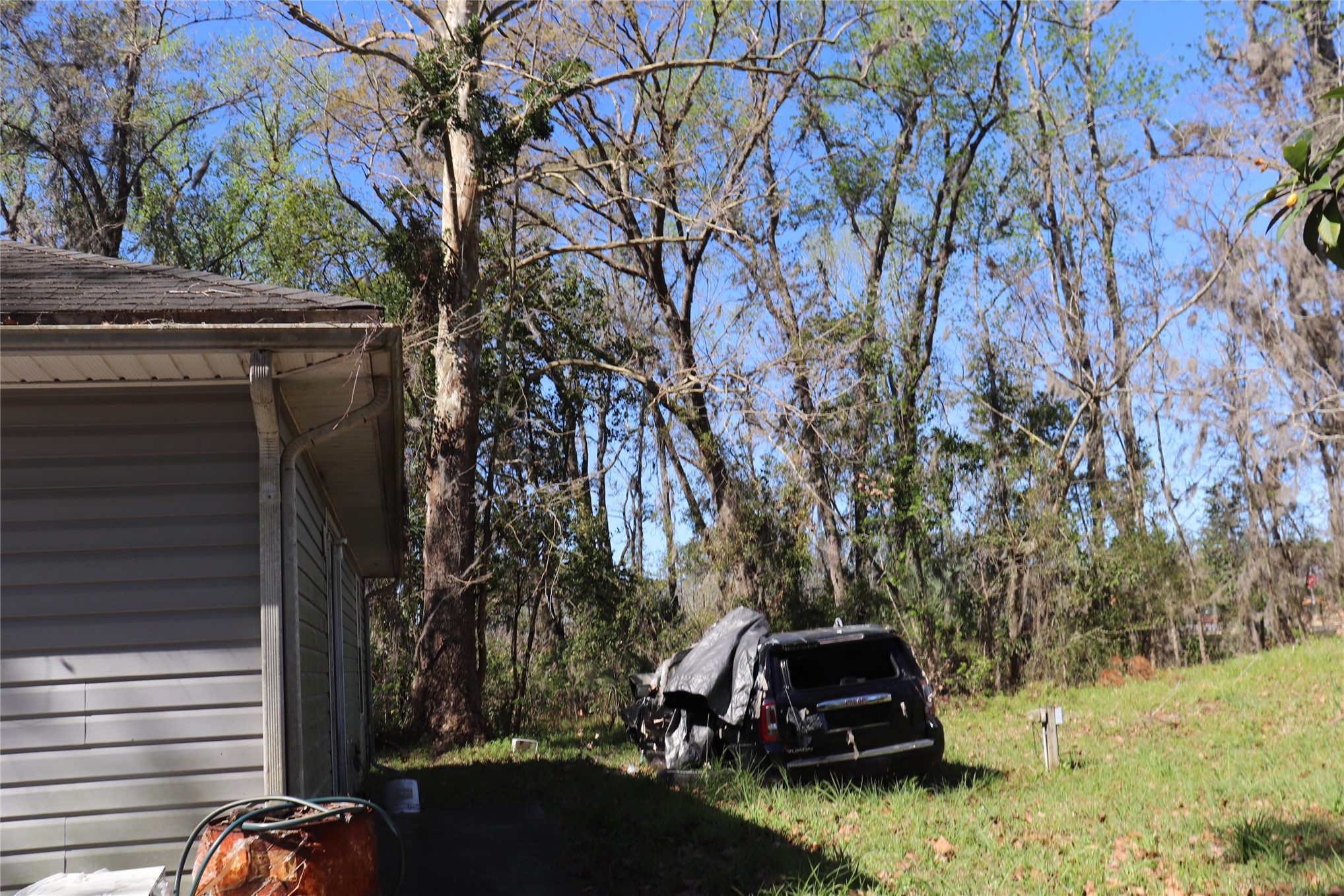 462973 State Road 200 Yulee, FL 32097 - Photo 5 of 18 a car parked in front of a house