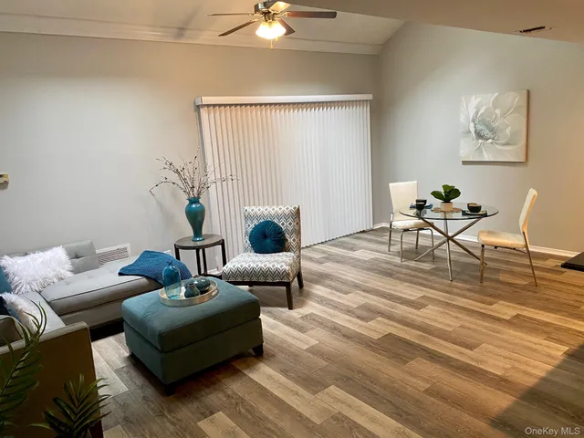a living room with furniture and a table