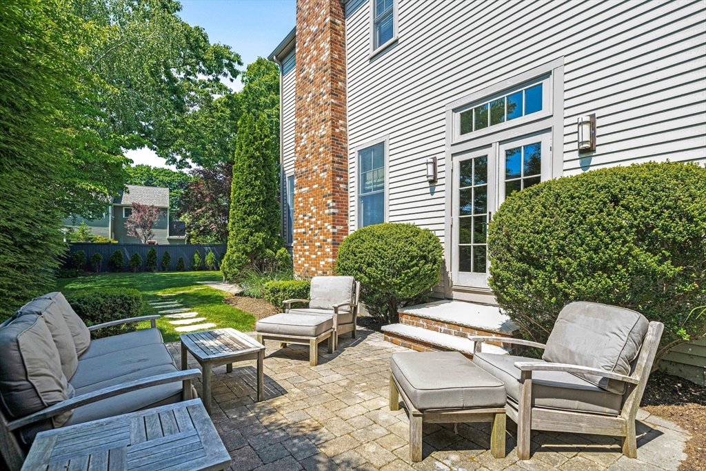 9 Patton Road Wellesley, MA 02482 - Photo 14 of 34 a view of a patio with couches table and chairs and potted plants