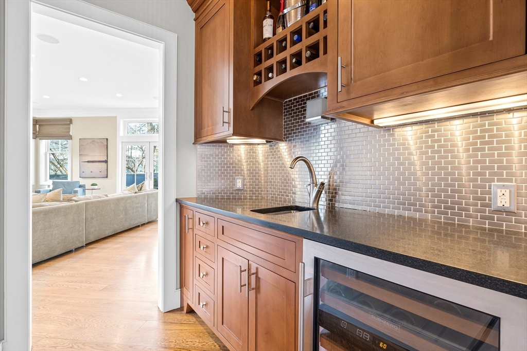 9 Patton Road Wellesley, MA 02482 - Photo 10 of 34 a kitchen with a sink and cabinets