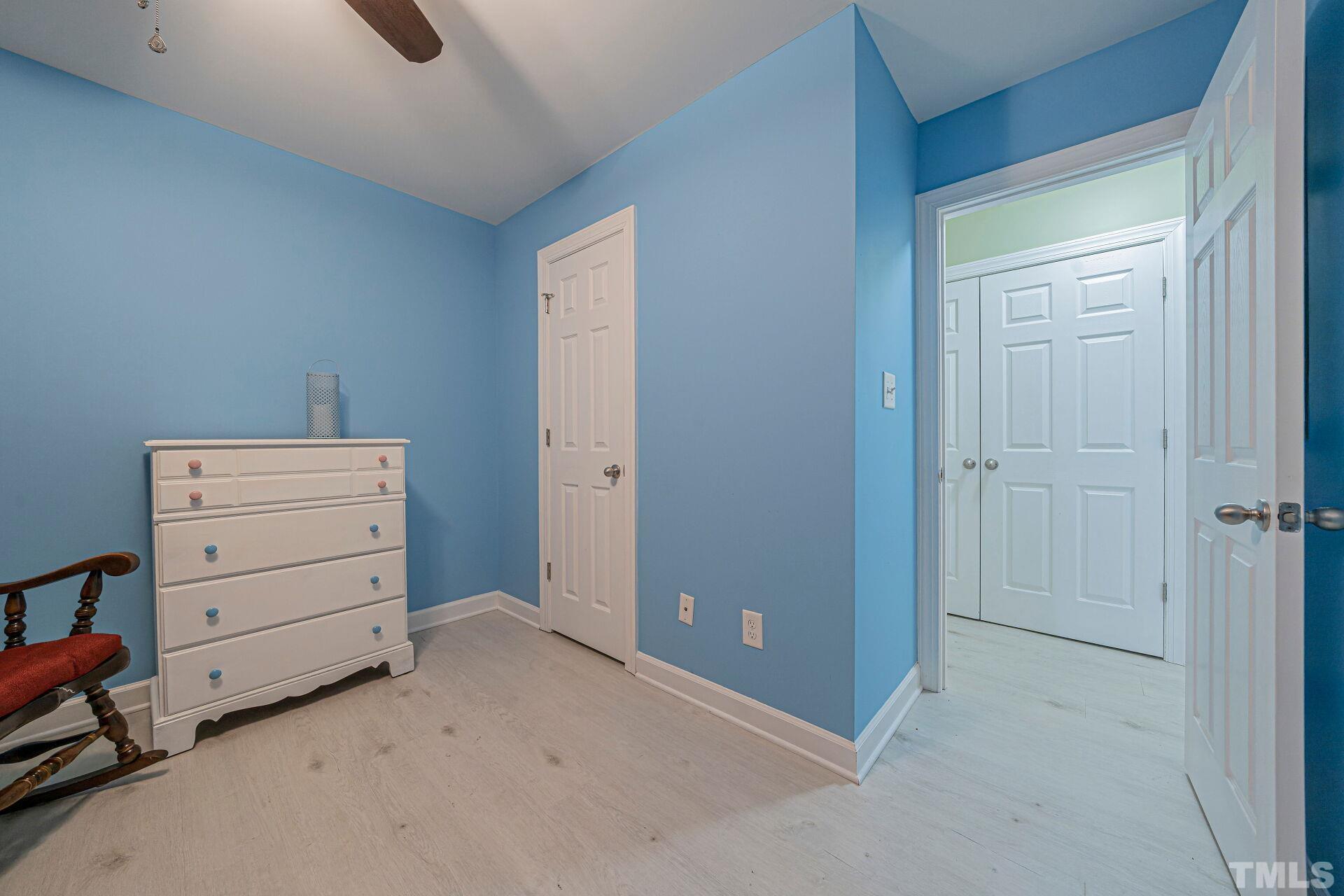 7039 Stokes Road Middlesex, NC 27557 - Photo 14 of 25 a room with furniture and closet