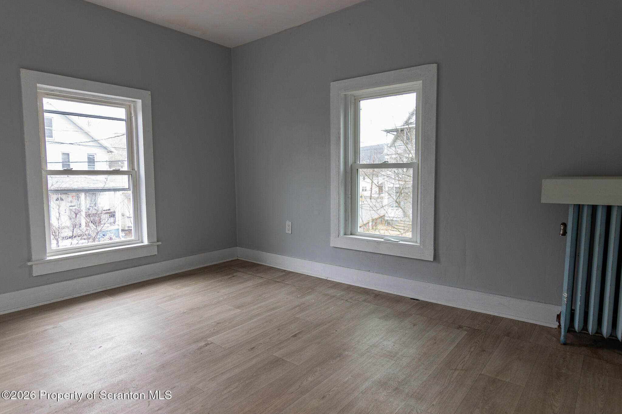 214 William Street Scranton, PA 18508 - Photo 19 of 33 a view of an empty room with a window