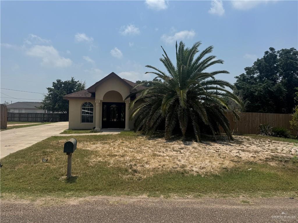 310 Adams Avenue Alton, TX 78573 - Photo 3 of 13 View of front of home featuring stucco siding