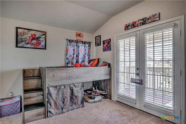 a room with furniture and a window