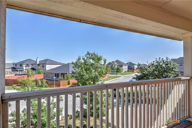a view of a city from a balcony