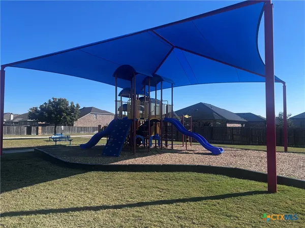a view of a house with a swimming pool