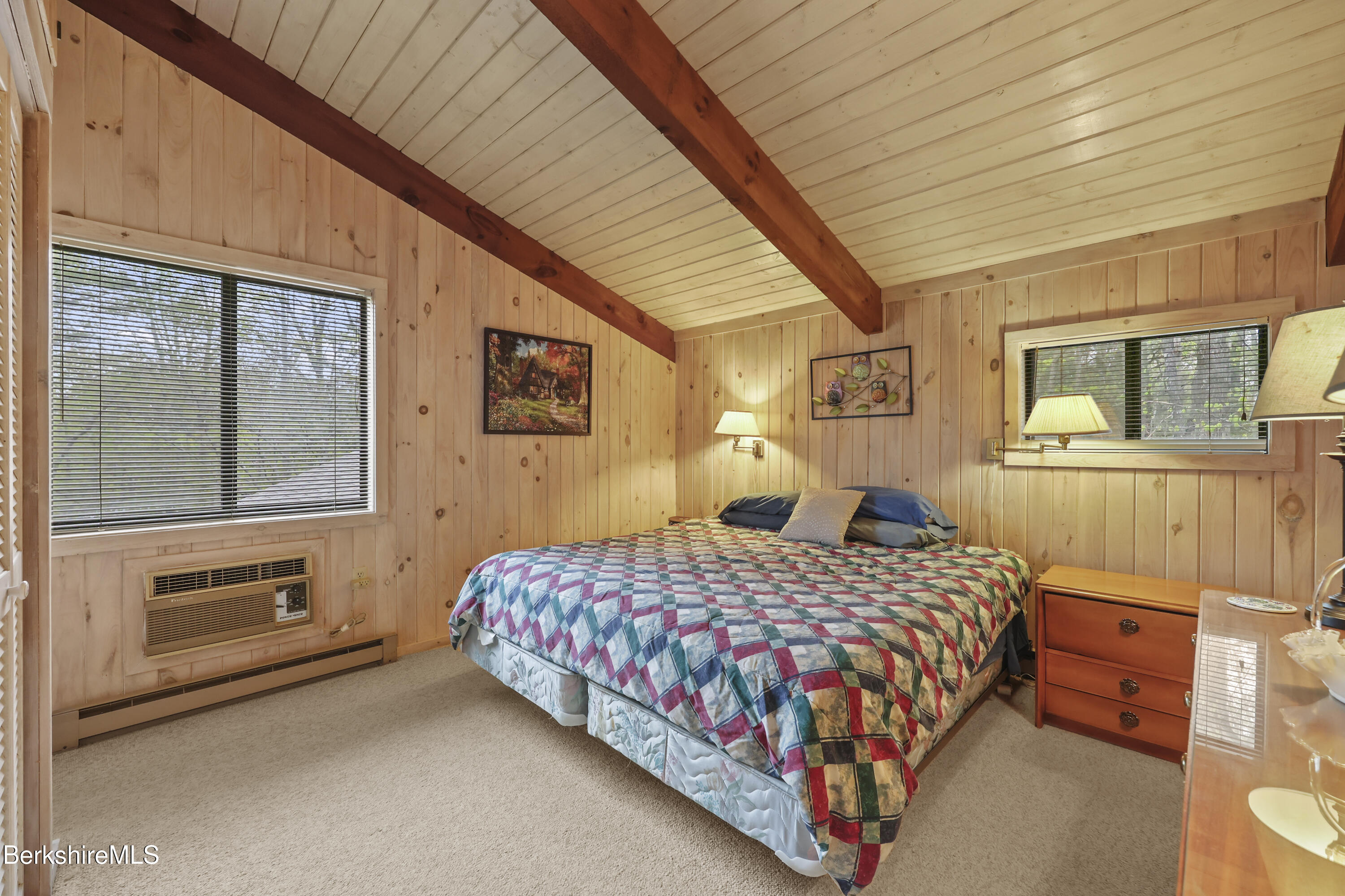422 Bonny Rigg Hill Road Becket, MA 01223 - Photo 40 of 60 a bedroom with a bed lamp and a window