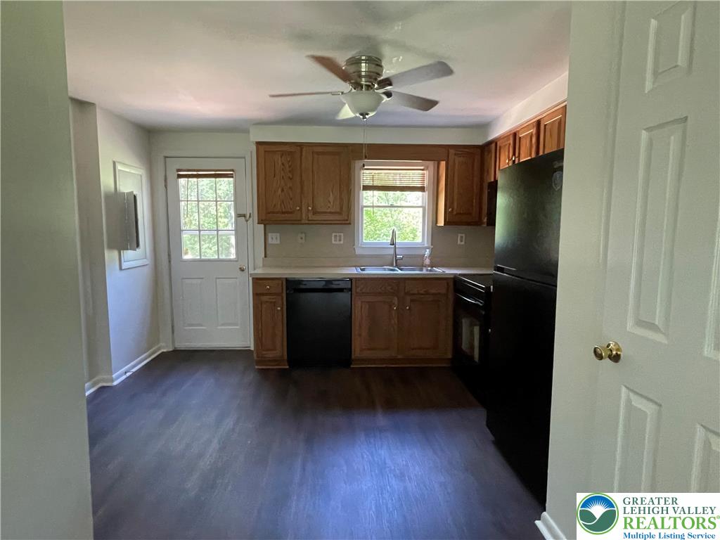 849 Weir Lake Road Kunkletown, PA 18058 - Photo 13 of 44 a kitchen with a sink a window and appliances