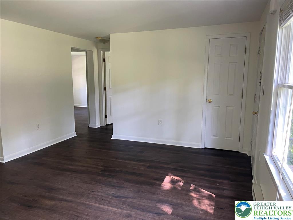 849 Weir Lake Road Kunkletown, PA 18058 - Photo 18 of 44 a view of an empty room and wooden floor