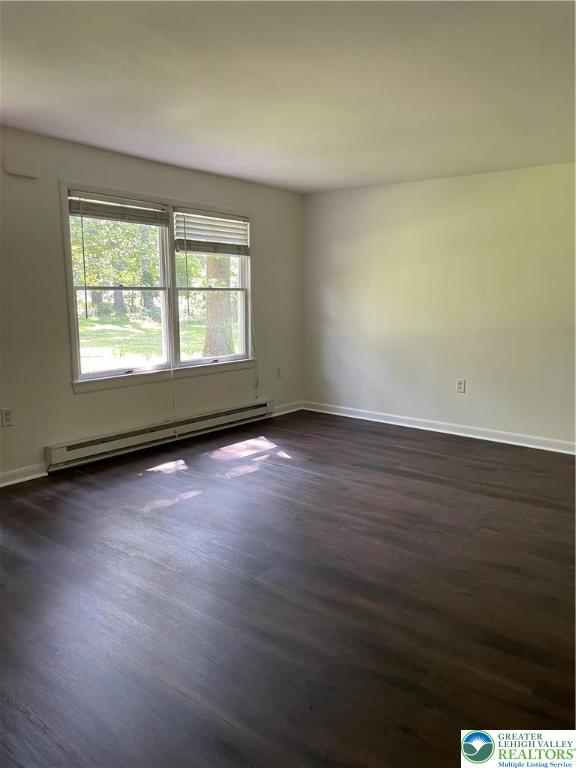 849 Weir Lake Road Kunkletown, PA 18058 - Photo 20 of 44 an empty room with wooden floor and windows