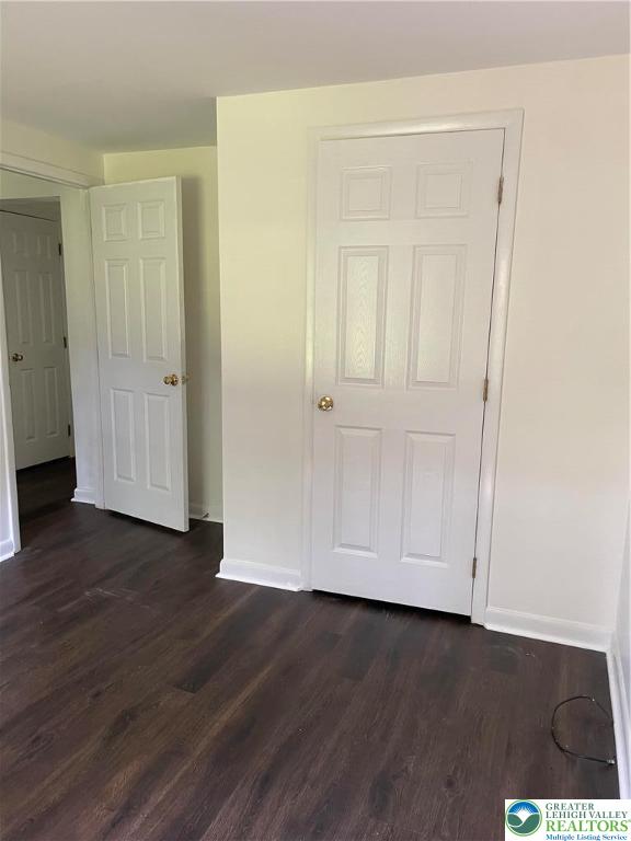 849 Weir Lake Road Kunkletown, PA 18058 - Photo 24 of 44 a view of an empty room with wooden floor