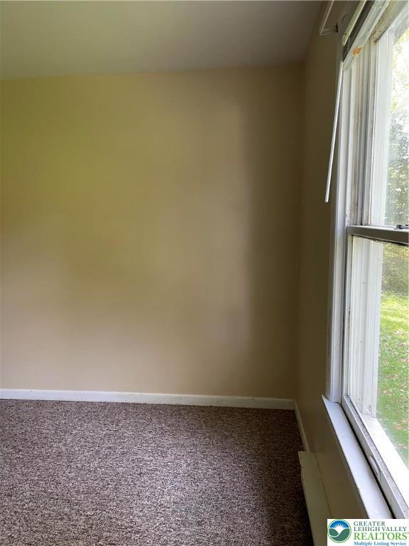 849 Weir Lake Road Kunkletown, PA 18058 - Photo 42 of 44 a view of an empty room and a window