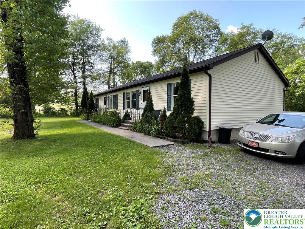 849 Weir Lake Road Kunkletown, PA 18058 - Photo 6 of 44 a view of a house with backyard