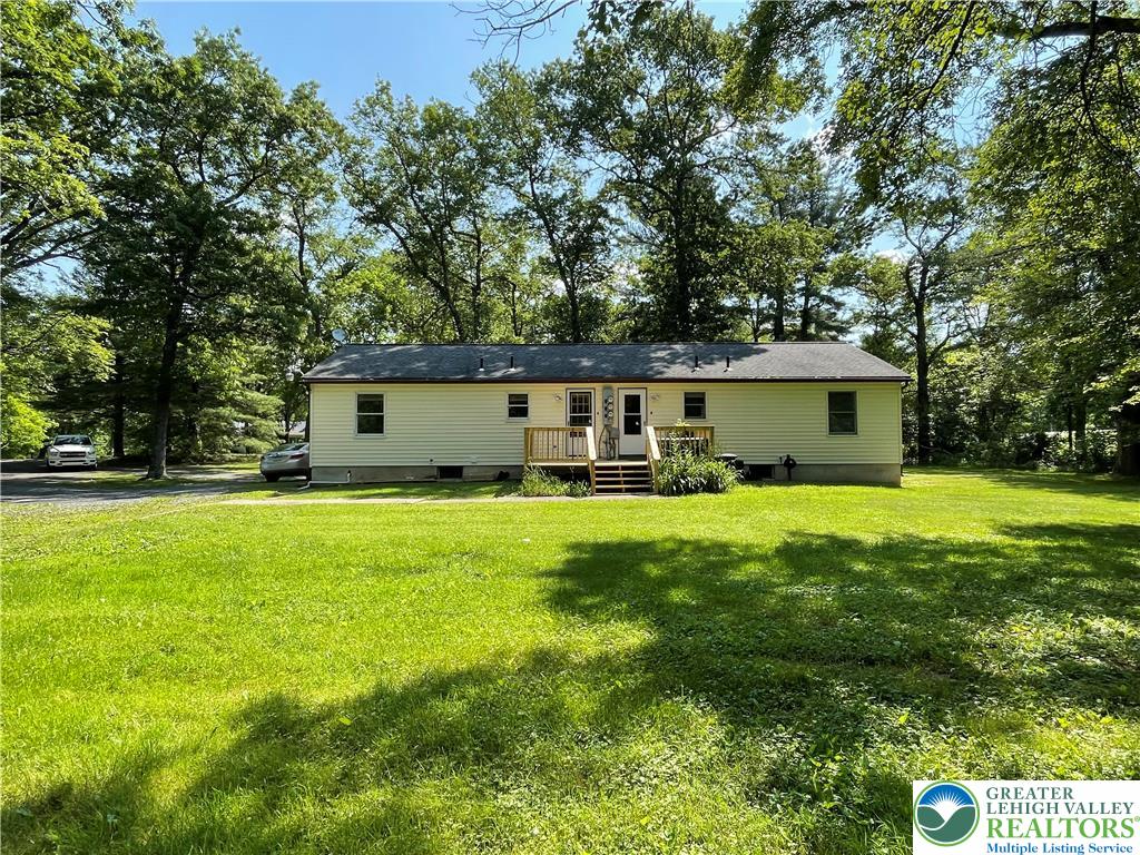 849 Weir Lake Road Kunkletown, PA 18058 - Photo 8 of 44 a front view of house with yard and green space