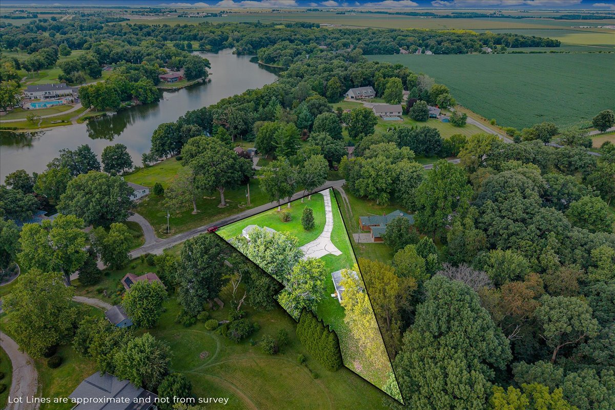 116 Lakeview Road East Galesburg, IL 61430 - Photo 2 of 36 an aerial view of lake residential house with outdoor space and trees around