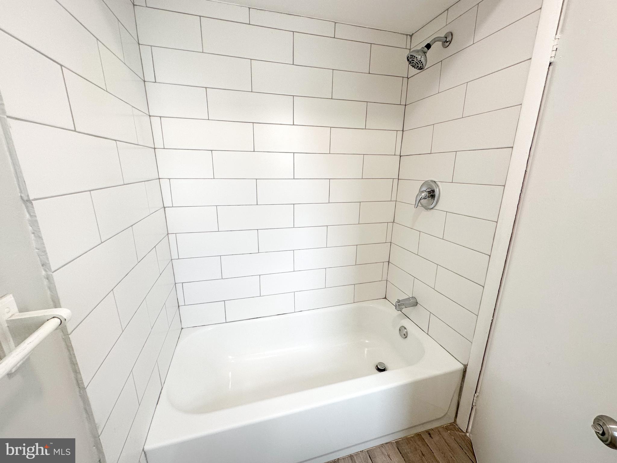 19 Lane Avenue, Unit 1 Gloucester City, NJ 08030 - Photo 11 of 18 a bathroom with a bathtub