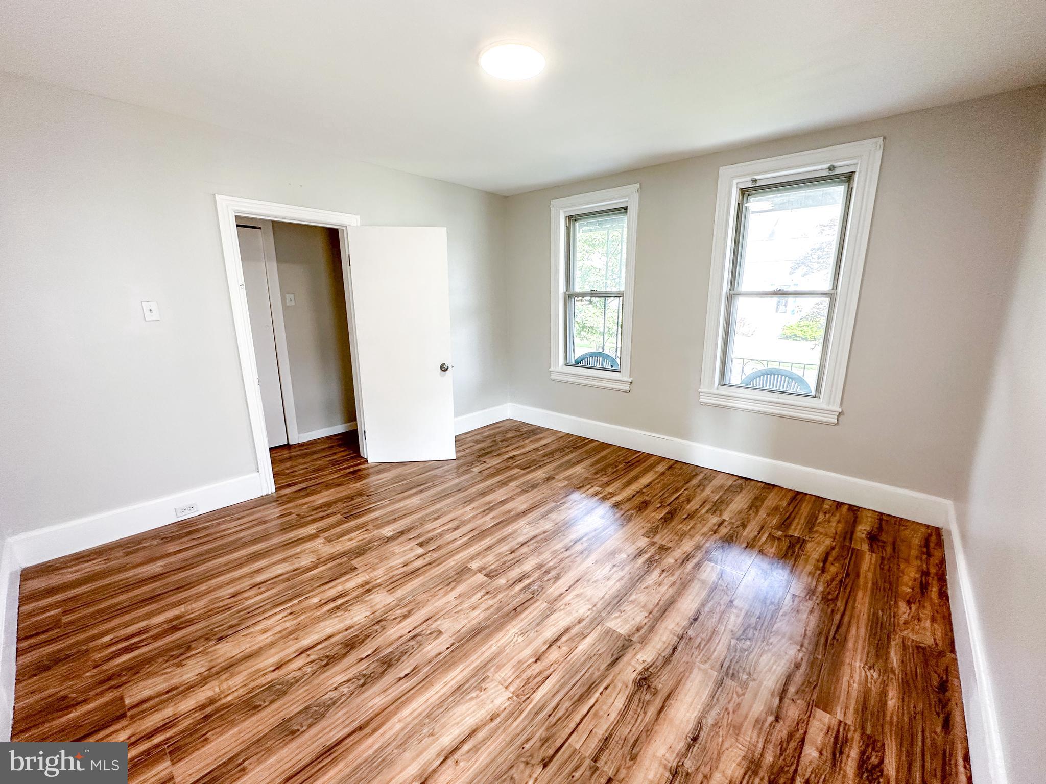 19 Lane Avenue, Unit 1 Gloucester City, NJ 08030 - Photo 14 of 18 a view of an empty room with wooden floor and a window