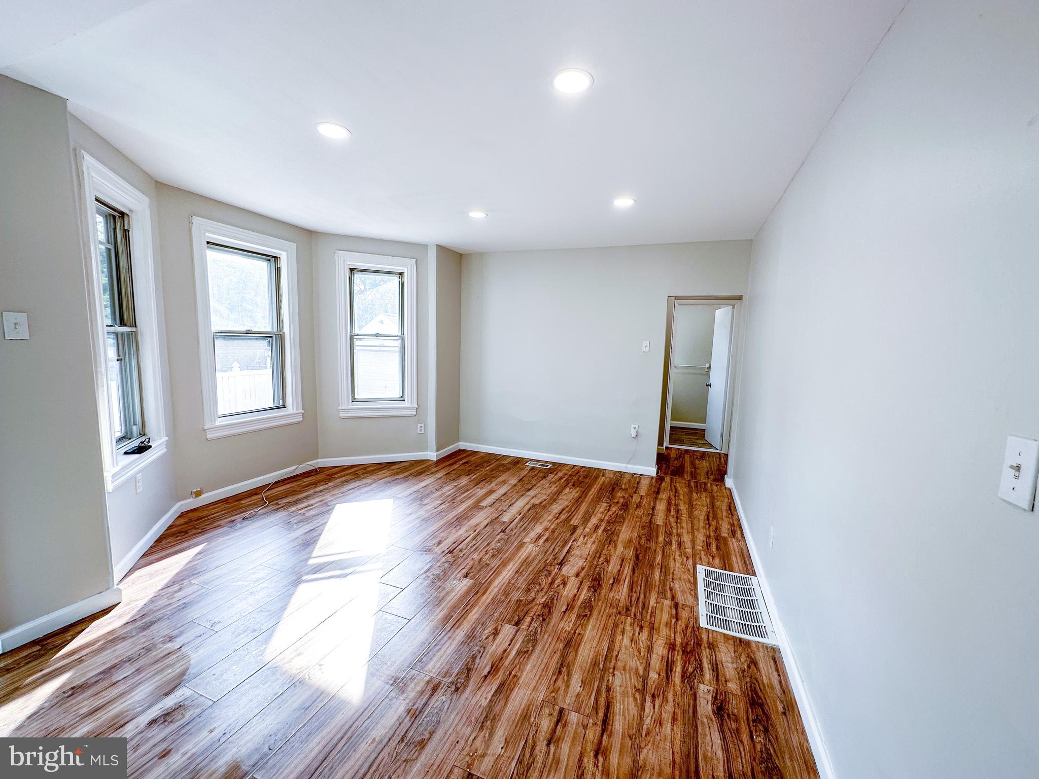 19 Lane Avenue, Unit 1 Gloucester City, NJ 08030 - Photo 6 of 18 a view of empty room with wooden floor