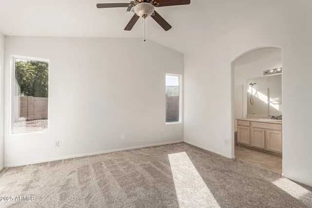 a view of an empty room and window