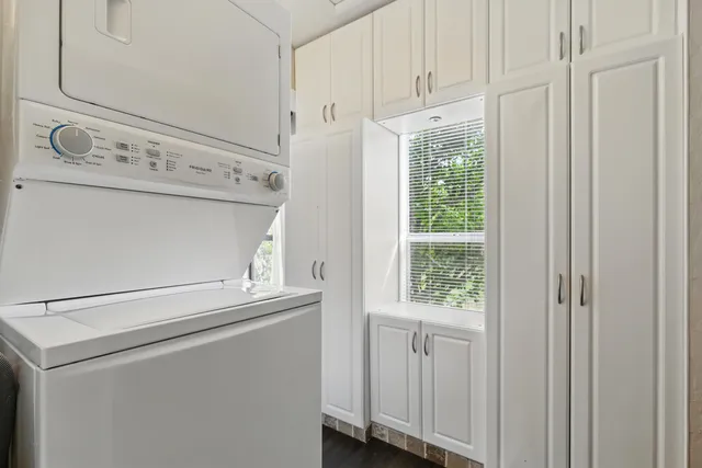 a view of a park with large trees