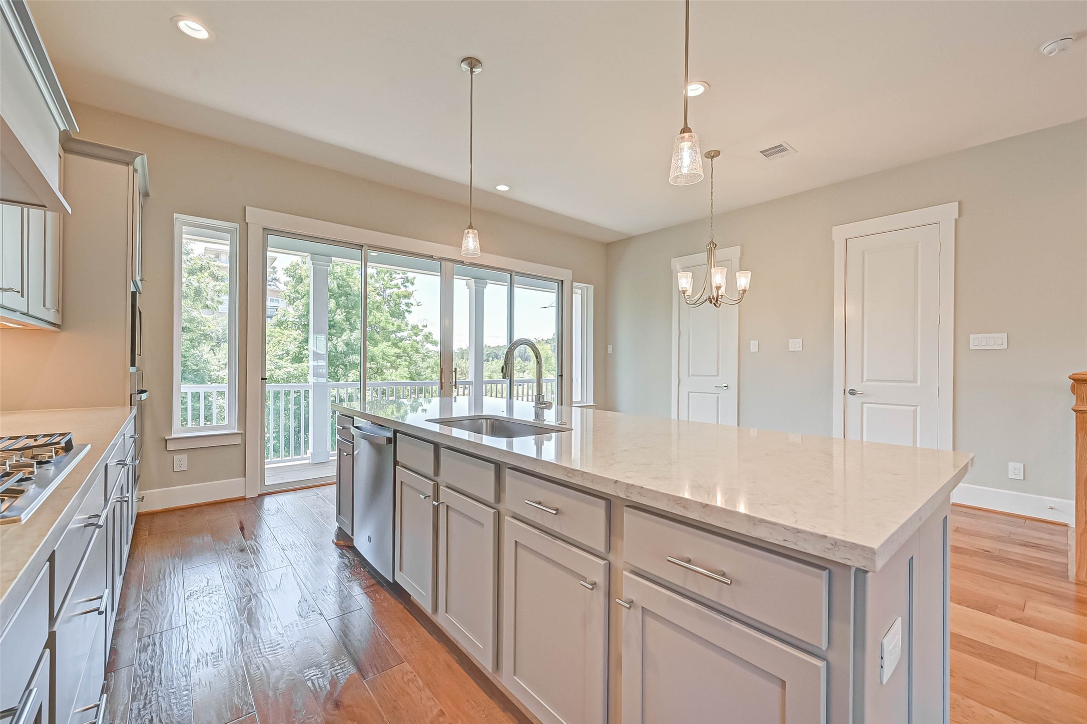 67 Thorpe Lane Spring, TX 77389 - Photo 15 of 27 a open kitchen with kitchen island a large counter top space a sink stainless steel appliances and cabinets