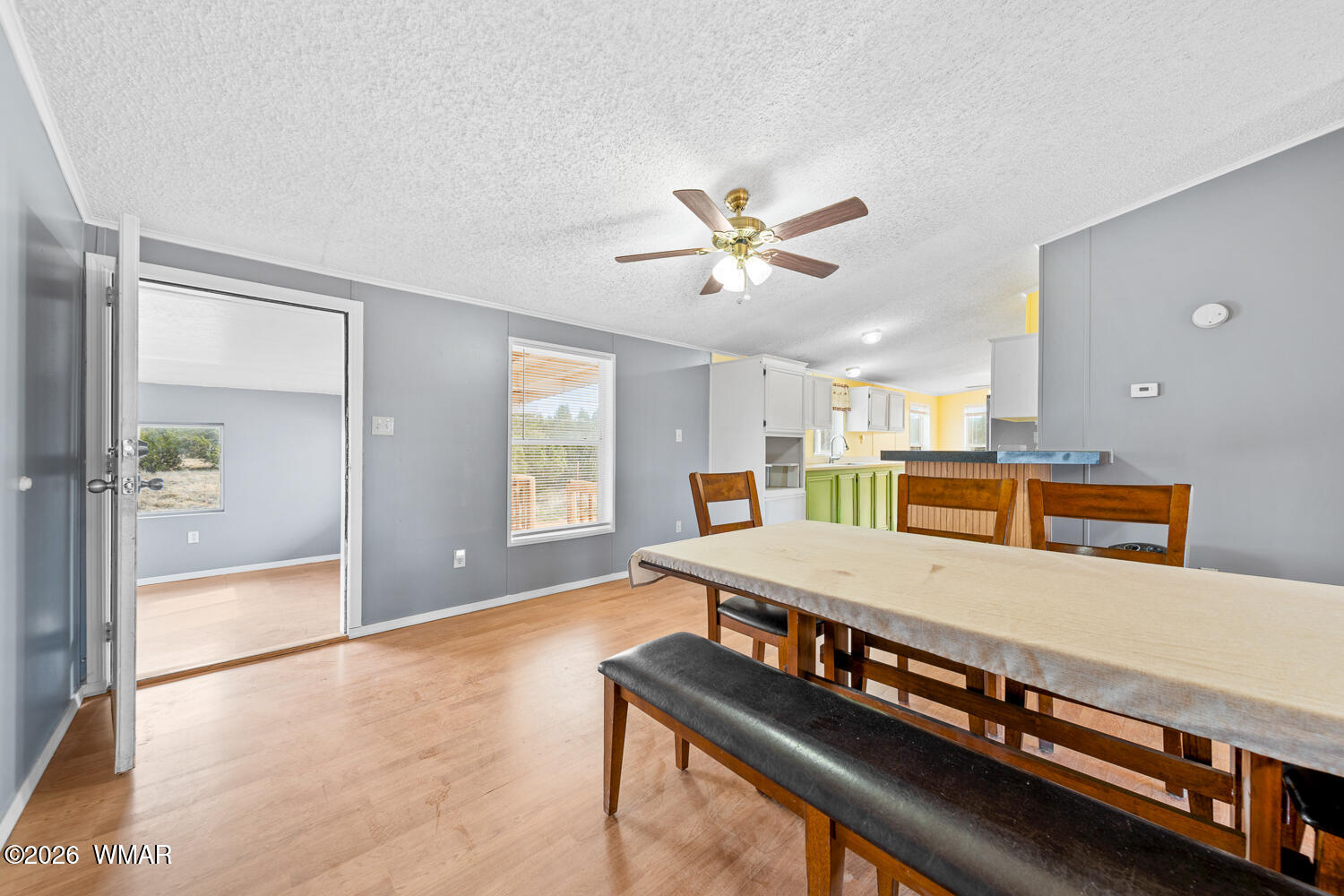4066 East Pinto Road Snowflake, AZ 85937 - Photo 22 of 49 You enter into the one of the dining areas with the Kitchen the left.