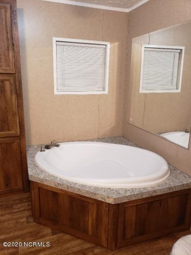 9700 Fire Tower Farm Road Whitakers, NC 27891 - Photo 8 of 12 Master Bath view 2 - Large Round Corner