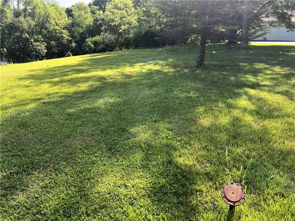 a view of an outdoor space and a yard