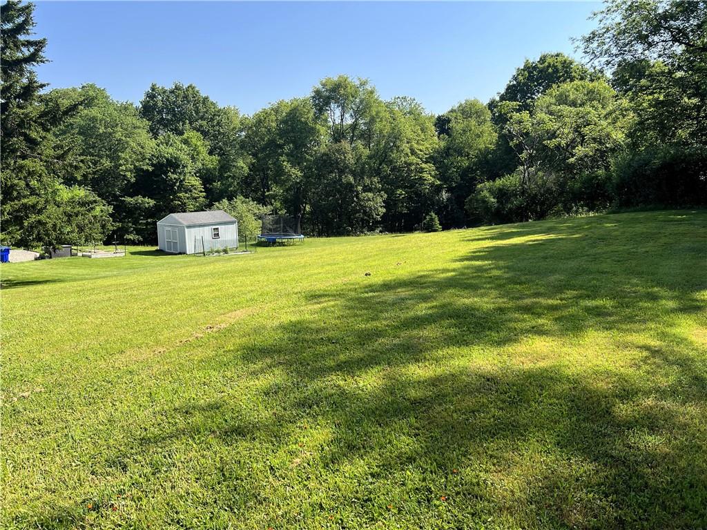 5326 Hardt Road Gibsonia, PA 15044 - Photo 3 of 4 a view of a big yard with a house