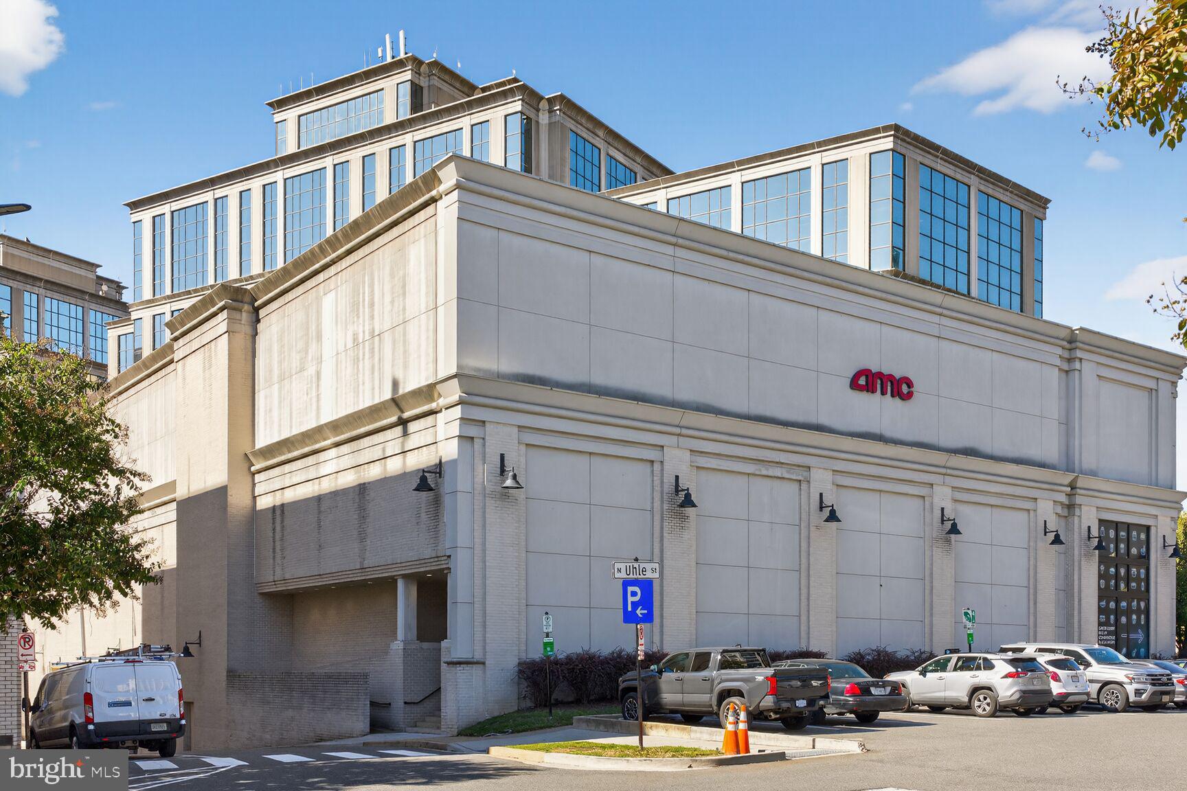 2330 14th Street North, Unit 205 Arlington, VA 22201 - Photo 18 of 29 a front view of a building with cars parked