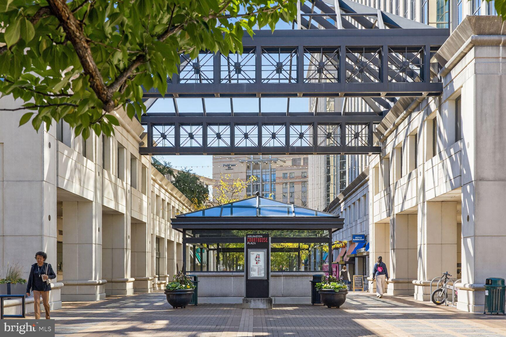 2330 14th Street North, Unit 205 Arlington, VA 22201 - Photo 23 of 29 a front view of a building with a garden