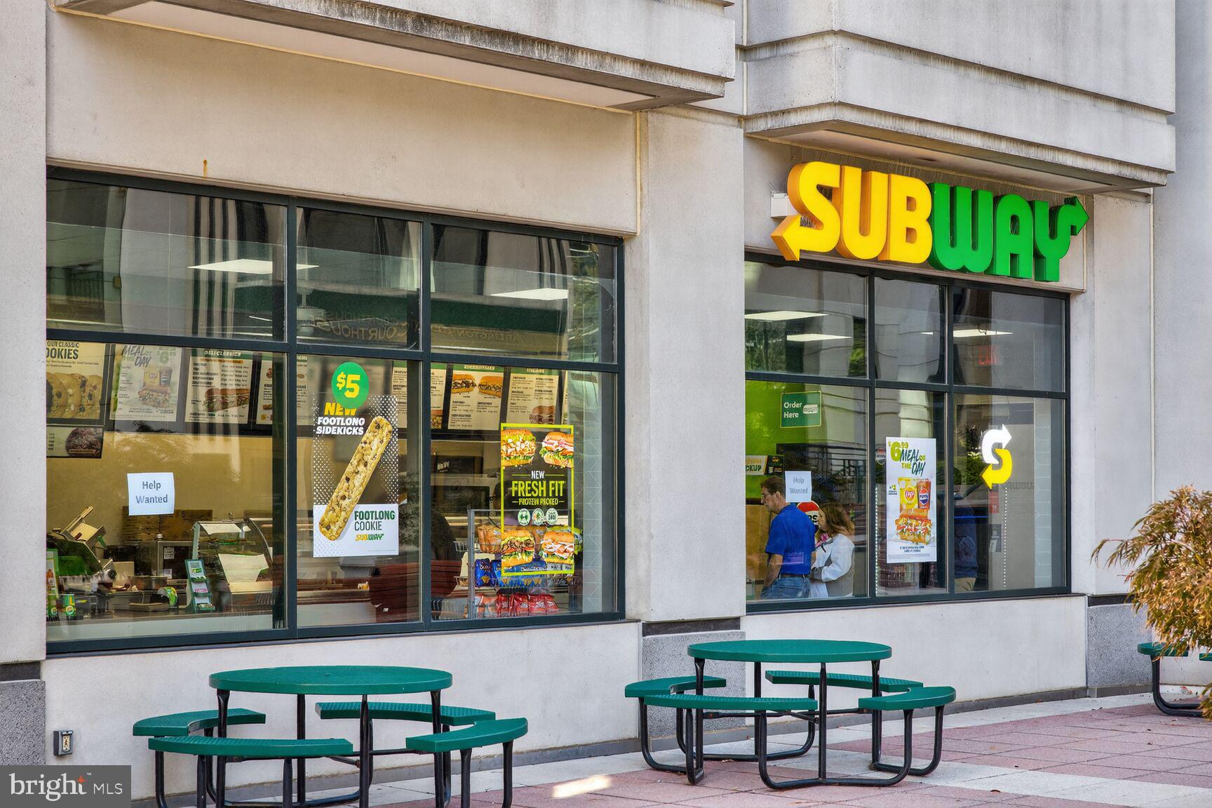 2330 14th Street North, Unit 205 Arlington, VA 22201 - Photo 26 of 29 a view of a chairs and table in a patio