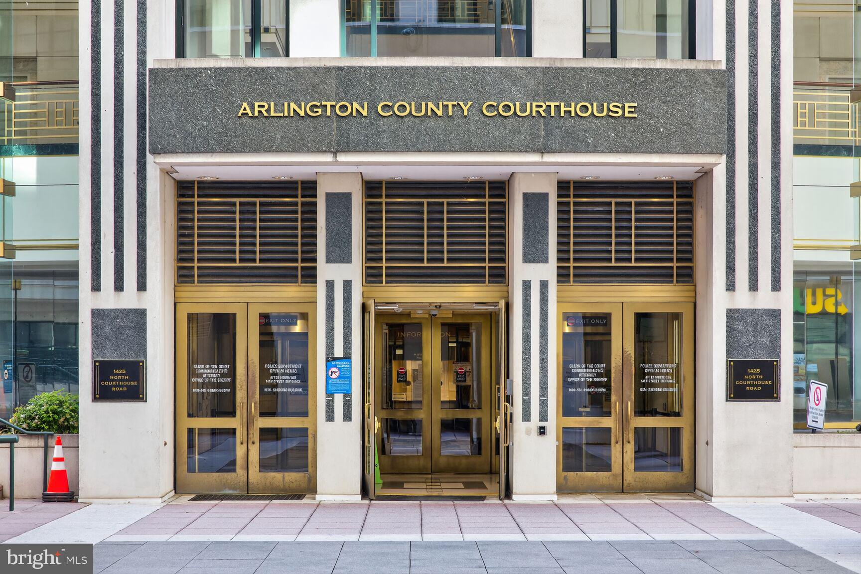 2330 14th Street North, Unit 205 Arlington, VA 22201 - Photo 27 of 29 a front view of a building with a glass door