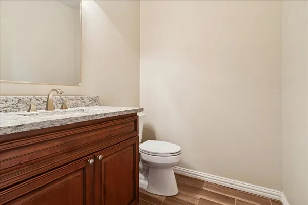 a bathroom with a sink and a toilet