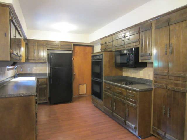 2120 Osburn Road Arrington, TN 37014 - Photo 4 of 20 Full kitchen w/refrigerator, double oven, cooktop, microwave, dishwasher. New laminate flooring