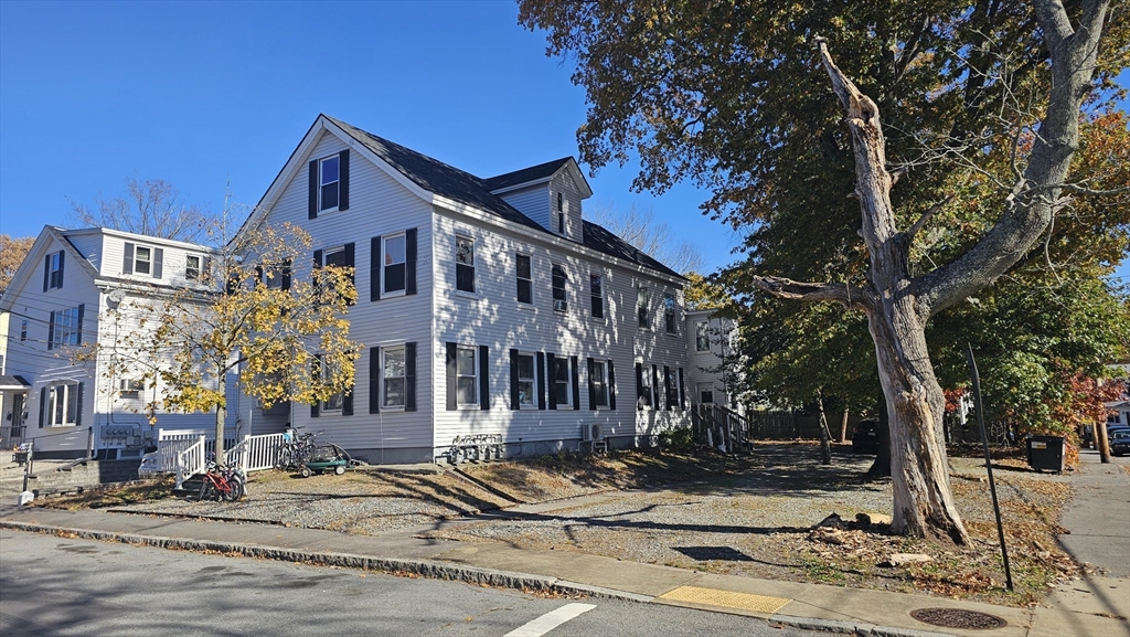 a front view of a building with street view
