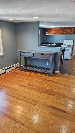a room with pool table and flat screen tv
