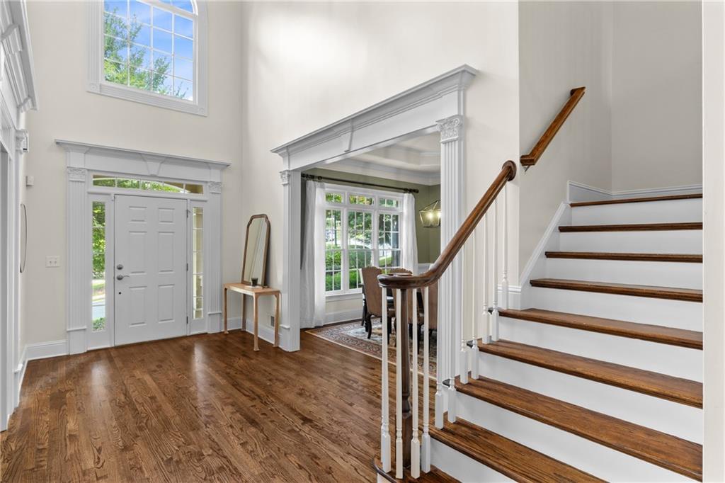 5765 Bailey Ridge Court Duluth, GA 30097 - Photo 20 of 53 a view of entryway with wooden floor and front door