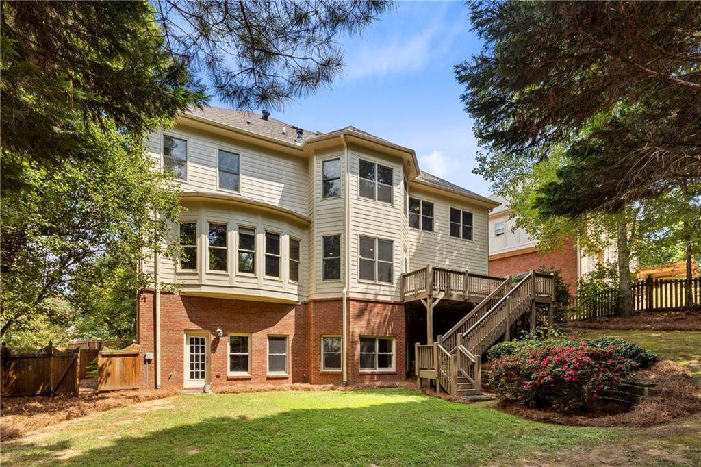 5765 Bailey Ridge Court Duluth, GA 30097 - Photo 52 of 53 a front view of a house with a yard