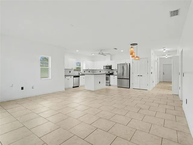 a view of a kitchen with a sink
