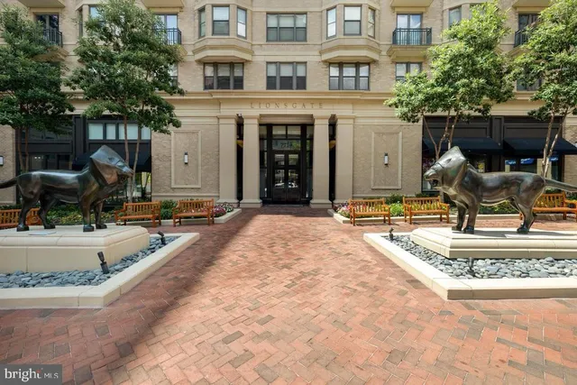 a view of a house with backyard porch and sitting area
