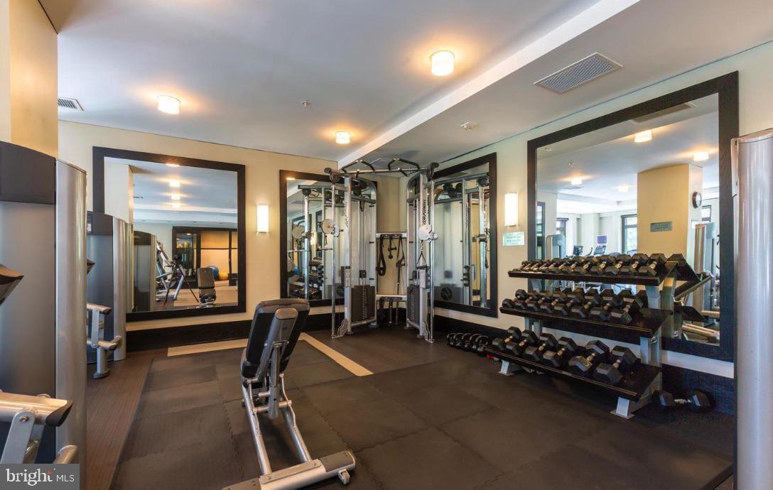 7710 Woodmont Avenue, Unit 911 Bethesda, MD 20814 - Photo 23 of 25 a view of a room with gym equipment